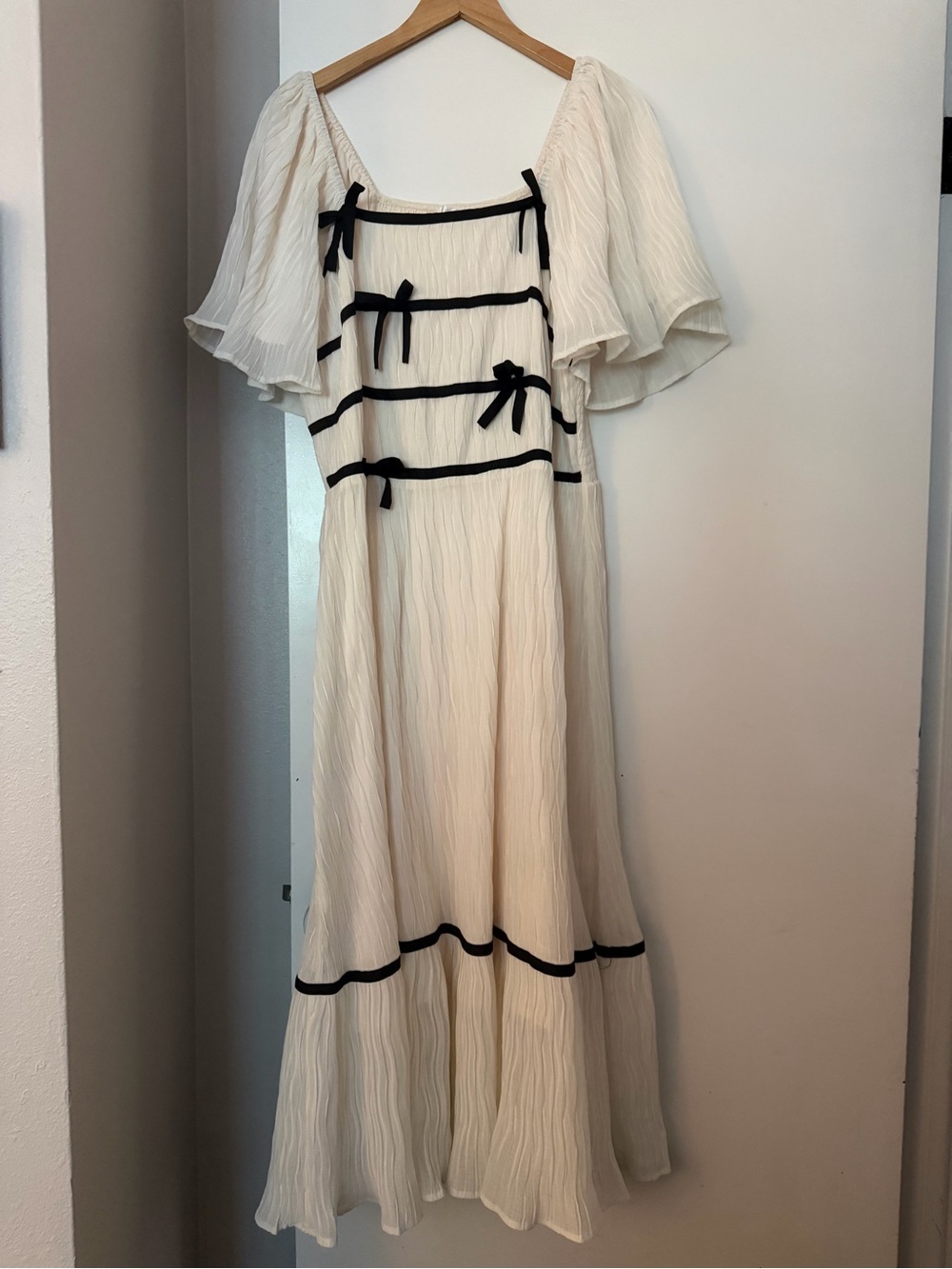 Shop Henly Cream Midi Dress with Black Trim and Bow Accents